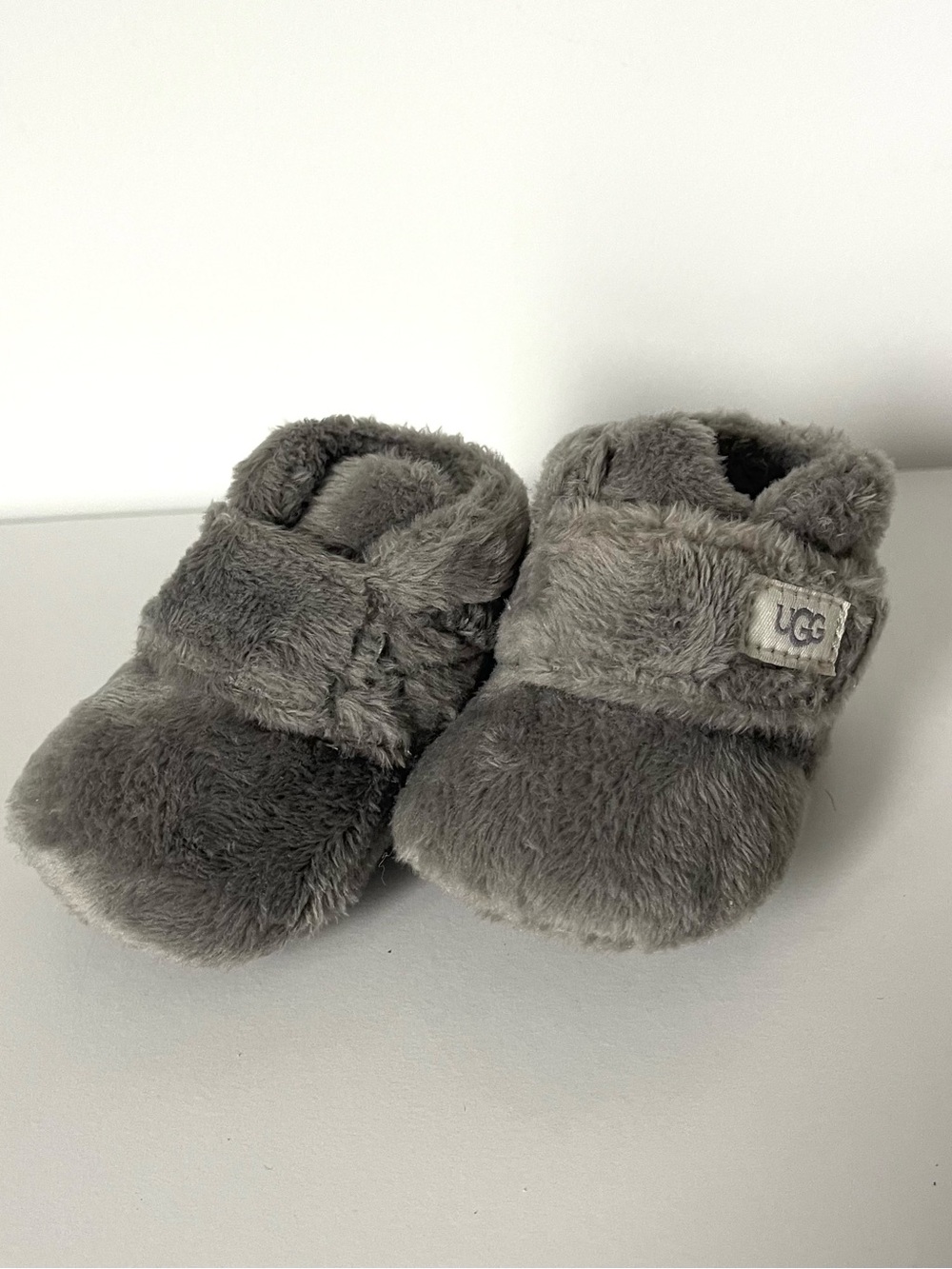 UGG “Bixbee” Plush Infant Slip-On Booties